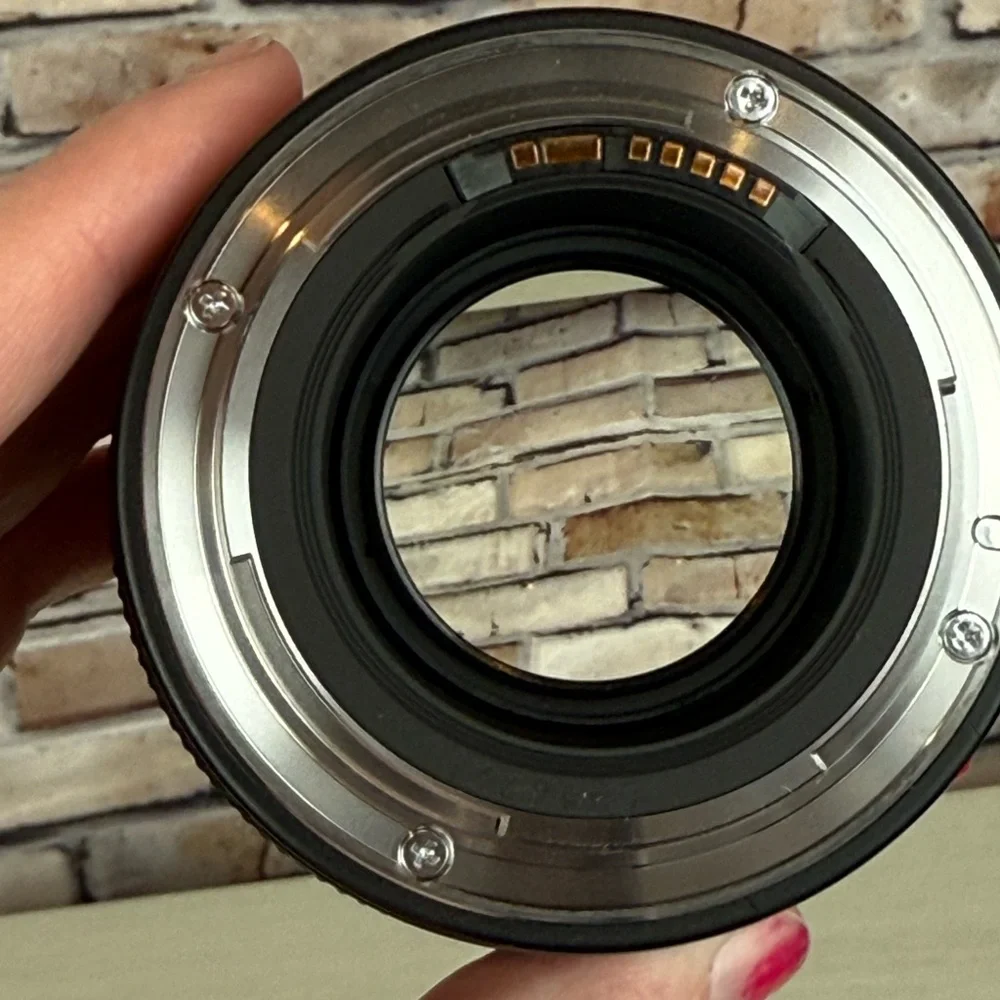 It’s the Canon EF Nifty 50! 1.4 EF